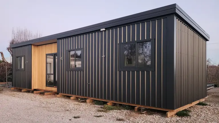 Two-bedroom orchard cabin exterior with windows