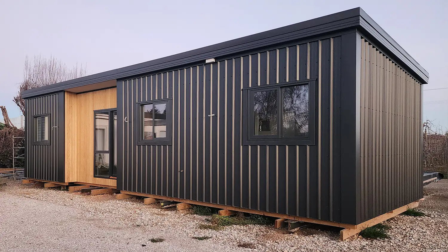 Two-bedroom orchard cabin exterior with windows