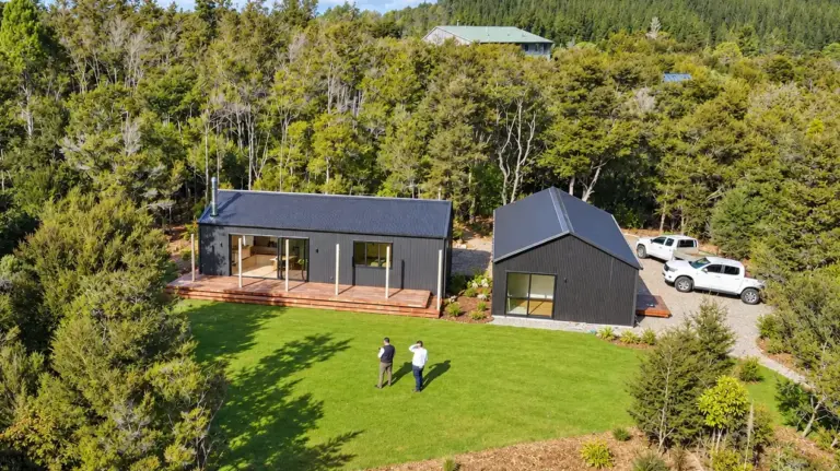 aerial-retirement-bach-and-garage-green-lawn-sandy-bay-motueka-nz