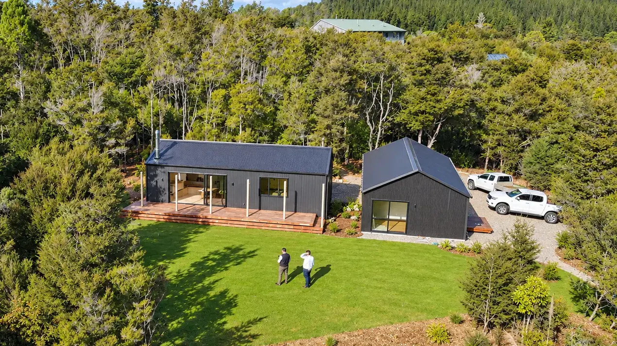 aerial-retirement-bach-and-garage-green-lawn-sandy-bay-motueka-nz
