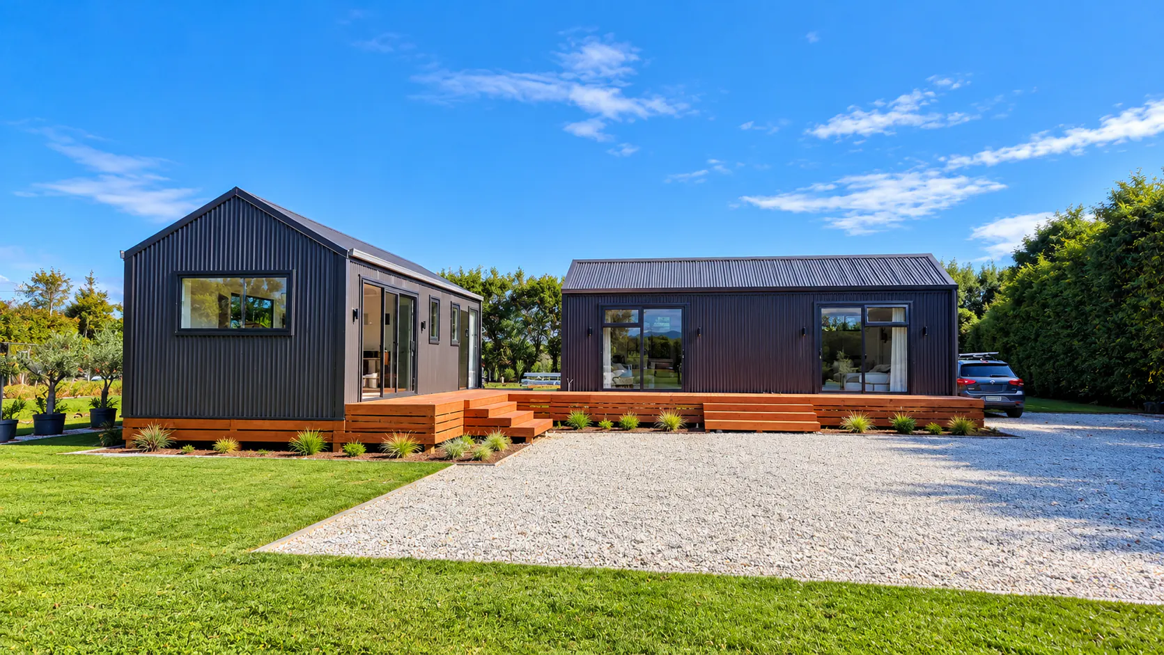 black clad office cabins lawn gravel driveway nz