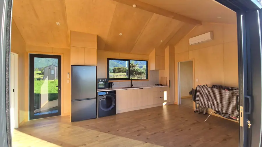 Modern dining and kitchen inside a Cosy Cabins home