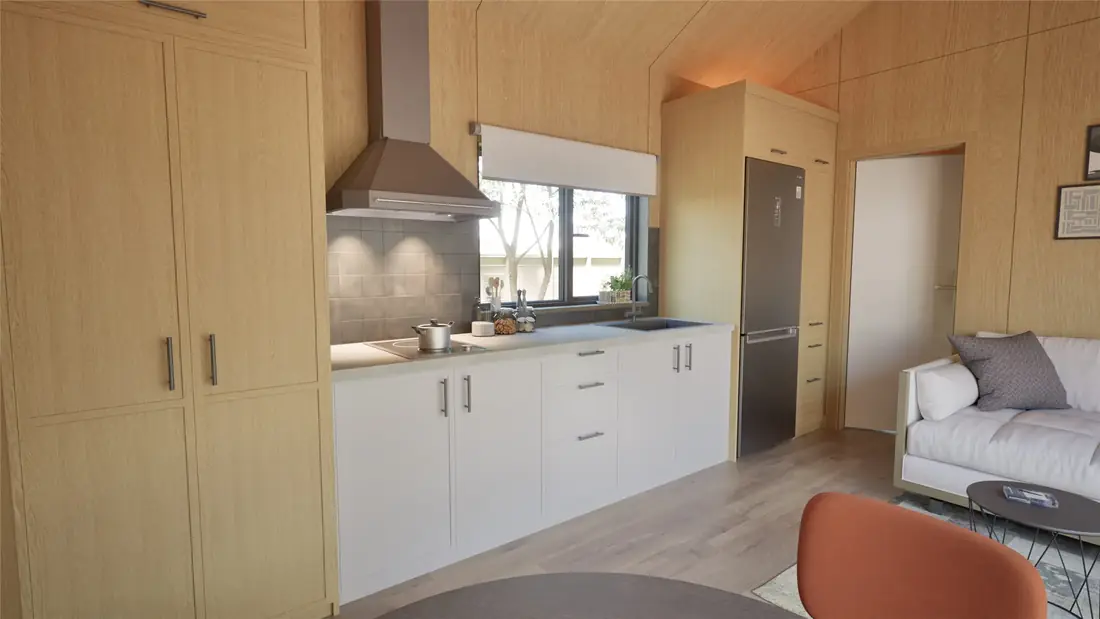 Modern open-plan kitchen inside the Cosy 48 transportable home