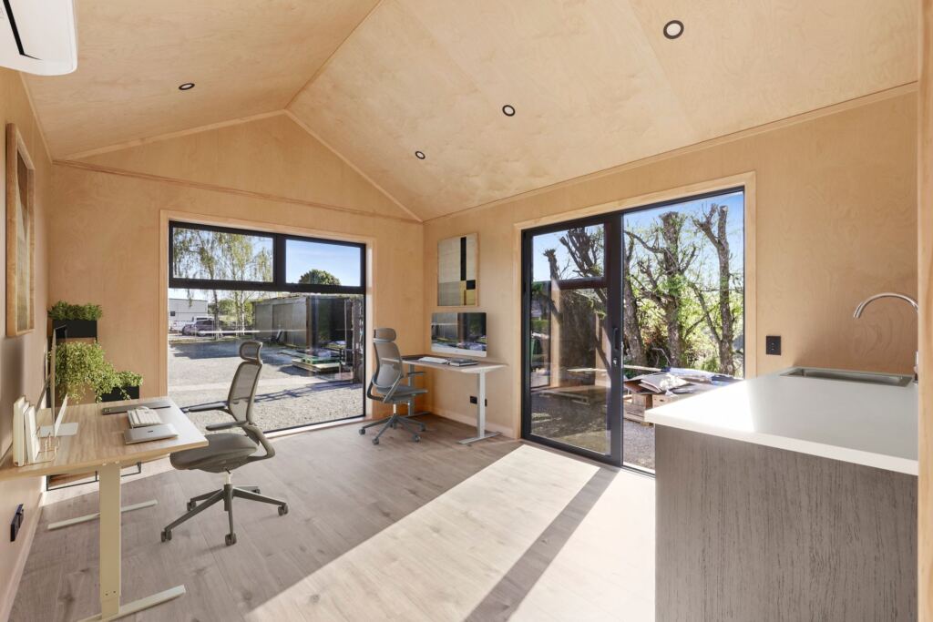 Inside a custom forestry office cabin with a standing desk workspace