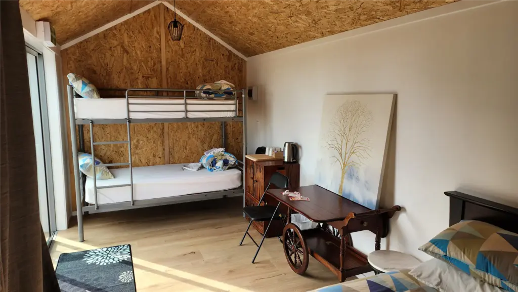 Holiday park cabin interior with bunk beds at Collingwood Holiday Park