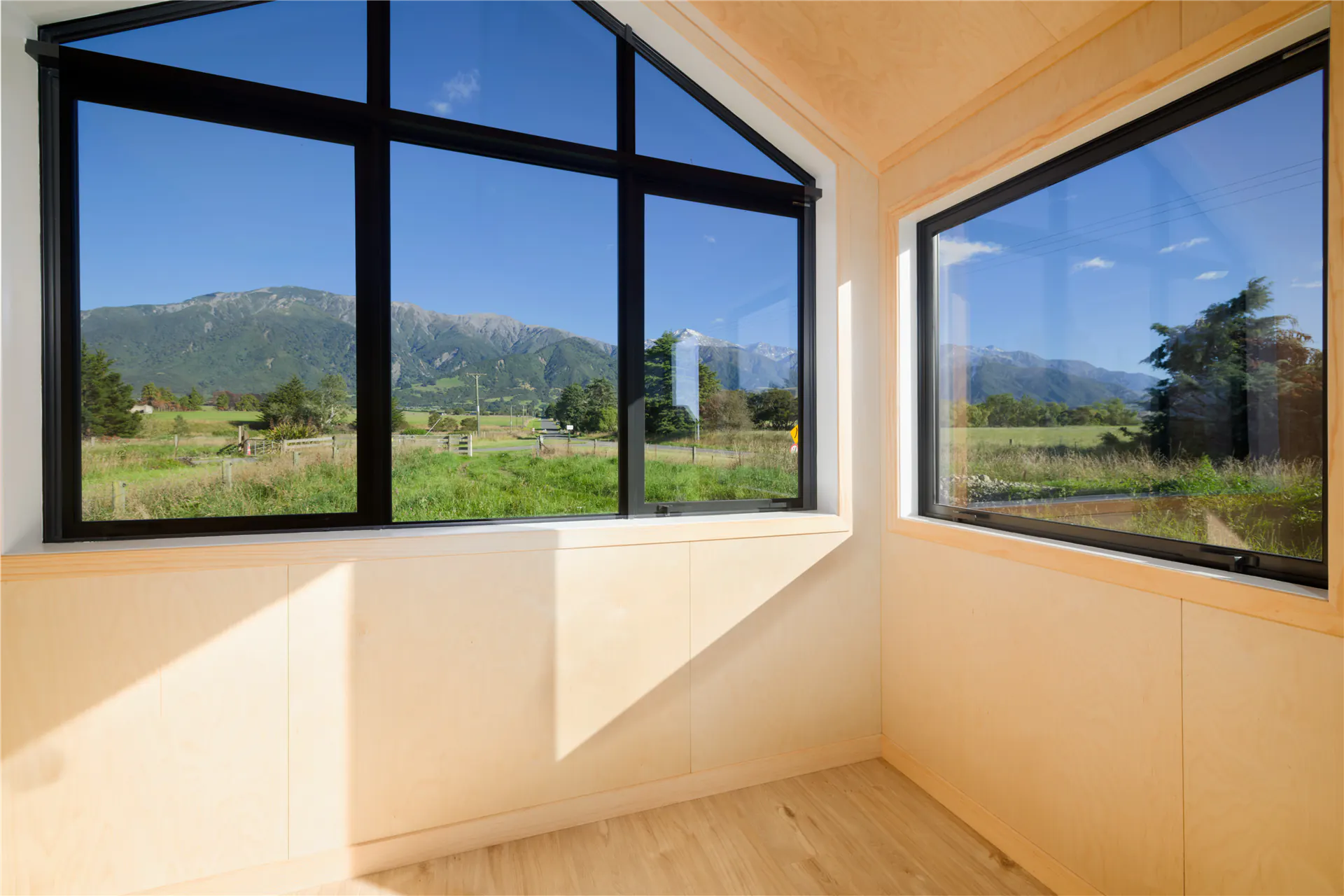 kaikoura bnb cabin bedroom corner windows nz