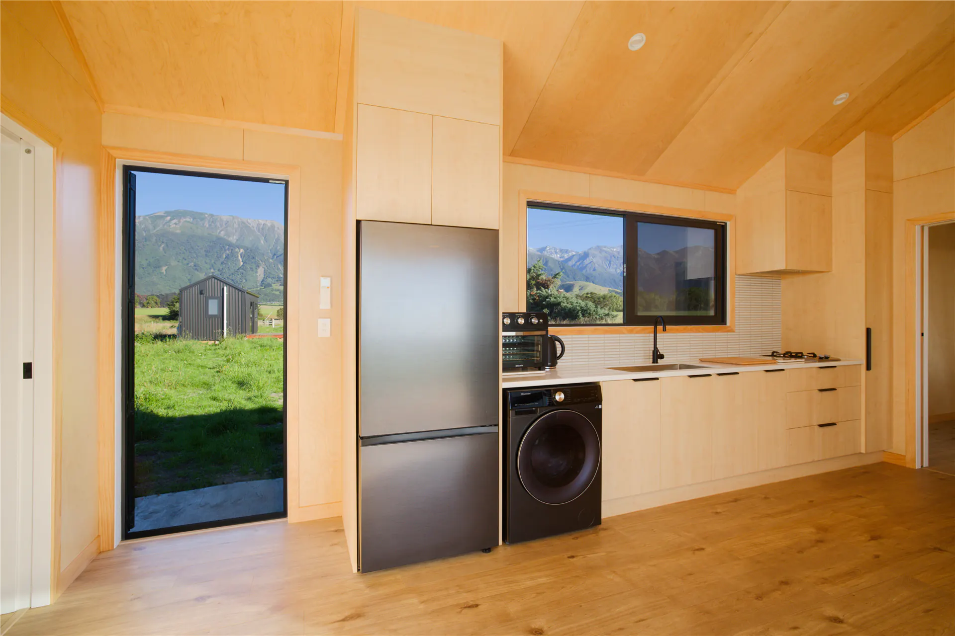 kaikoura bnb cabin kitchen laundry timber lined interior nz