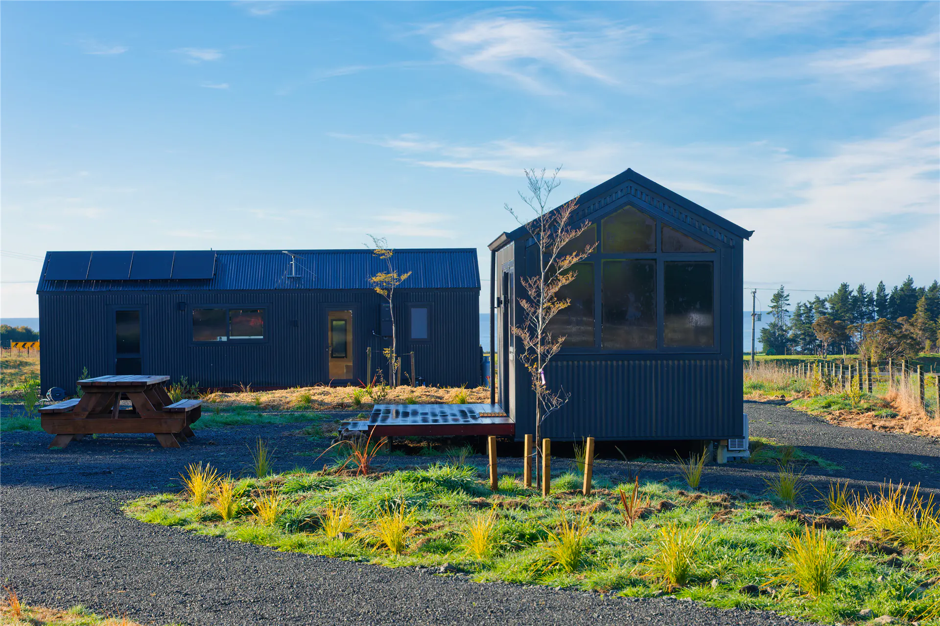 kaikoura tiny cabin black cladding timber deck nz