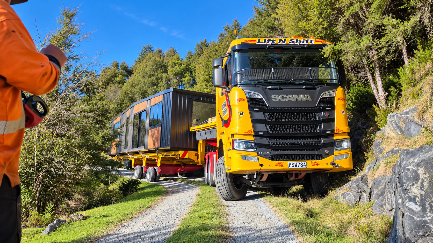 tiny home delivery truck forest road takaka hill nz