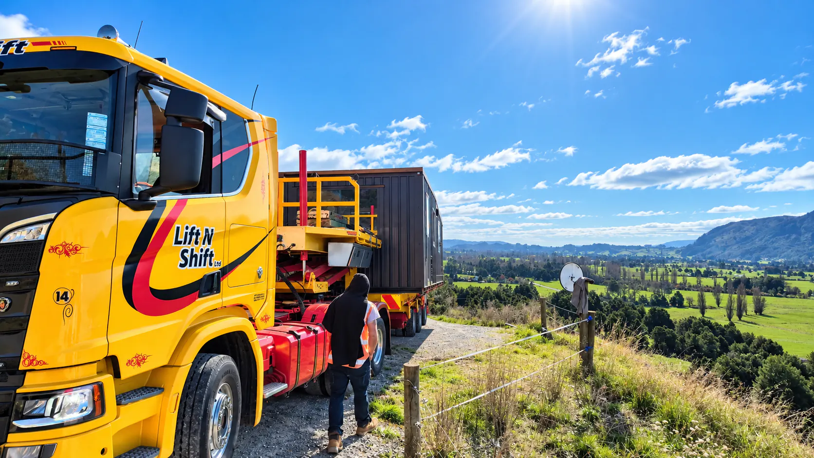tiny home delivery truck overlooking mountain valley nz