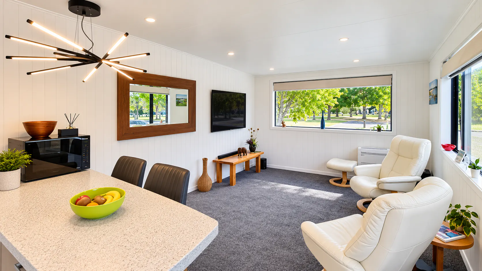 tiny home lounge dining natural light bethany park kaiteriteri nz